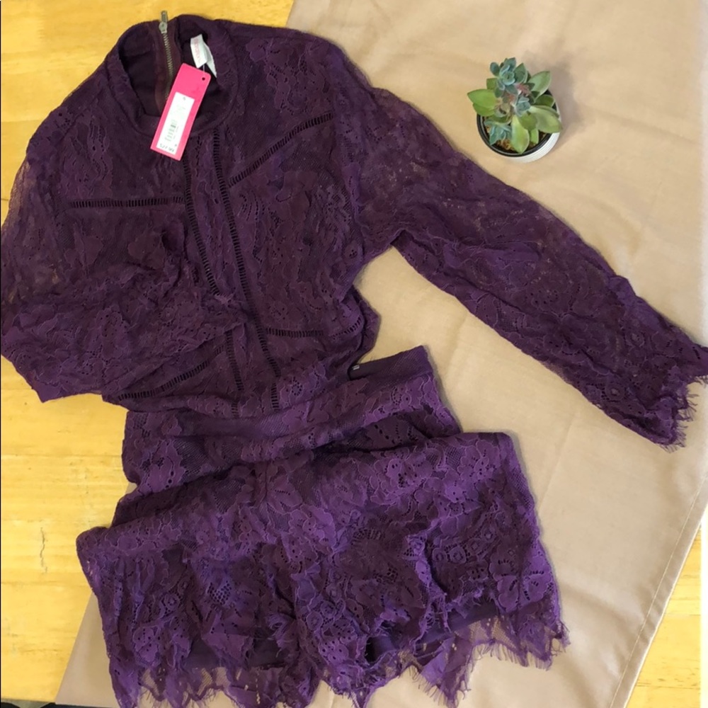 Purple lace short romper.